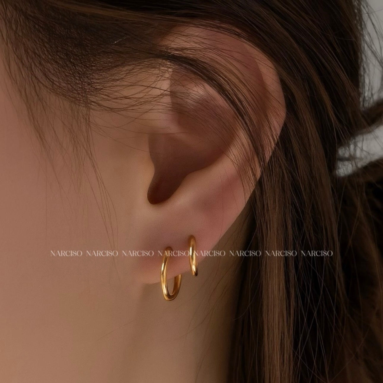 Trío de piercings