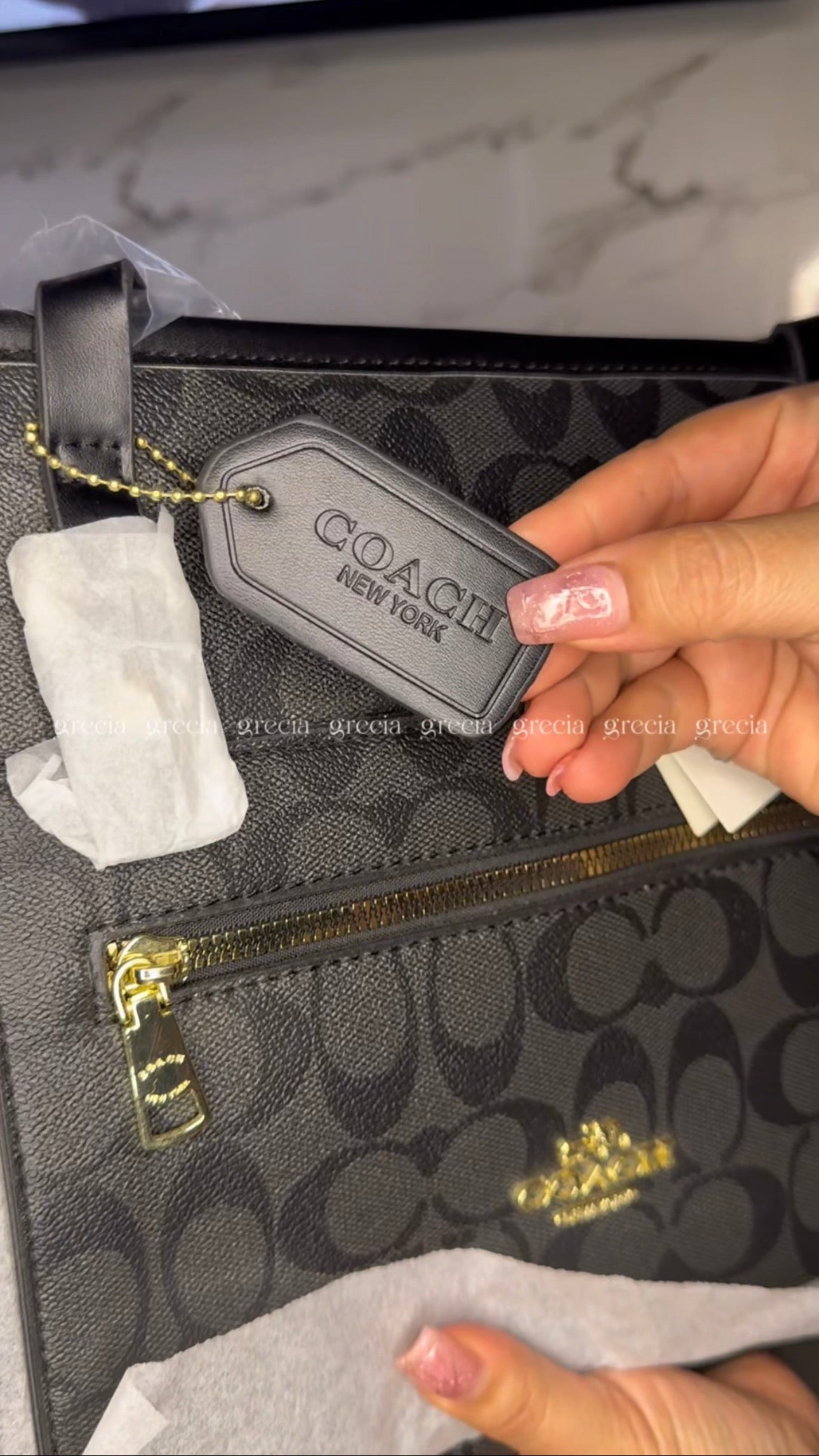 Coach XL negra