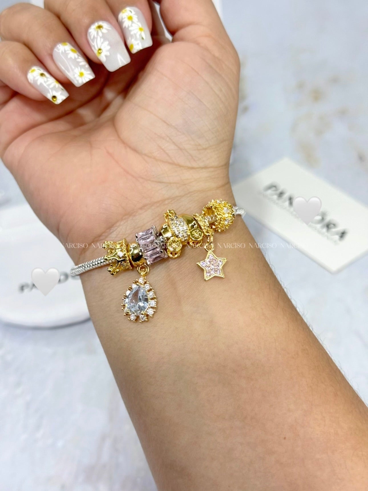 Pandora rosado, plateado y dorado