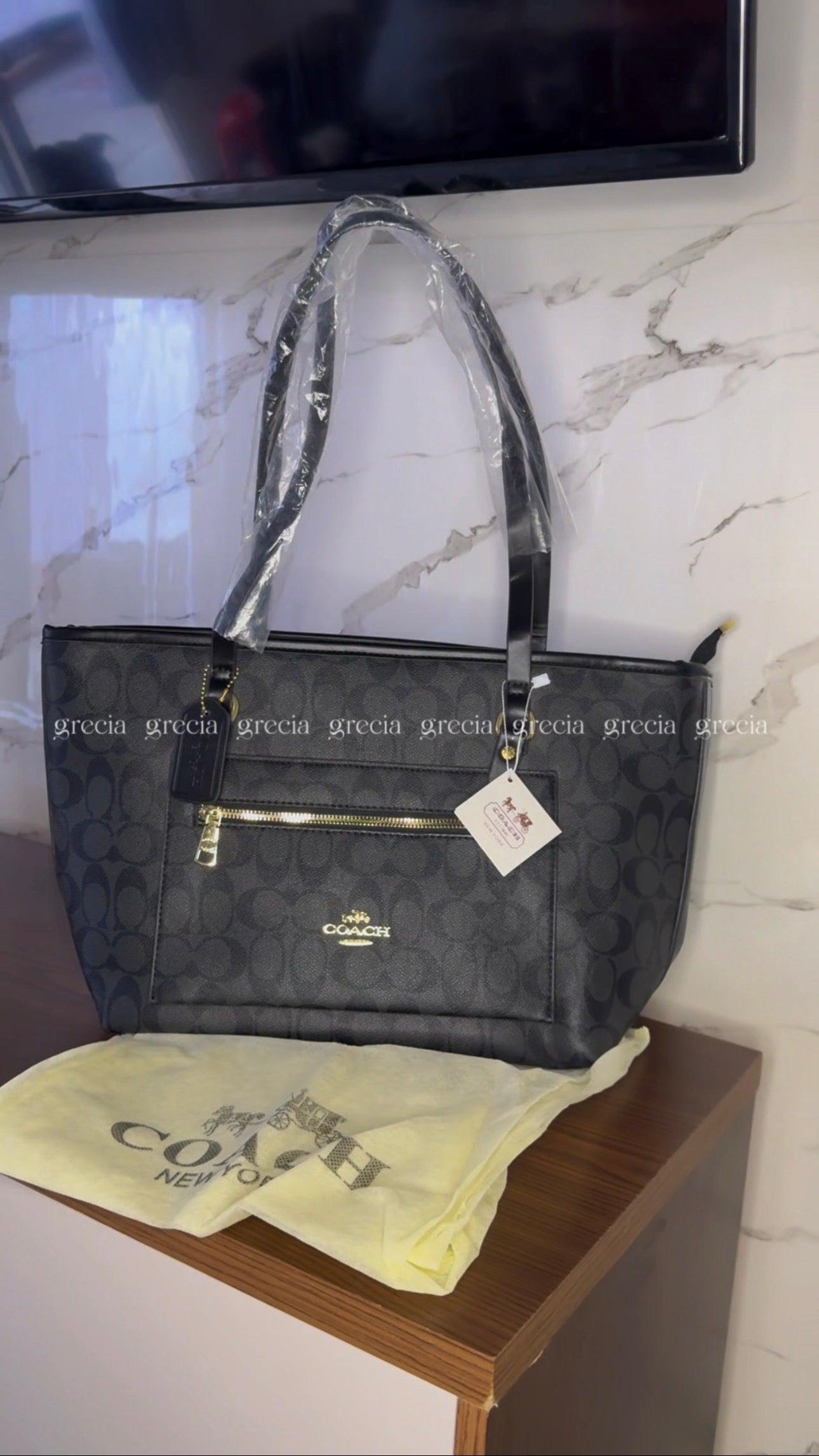 Coach XL negra
