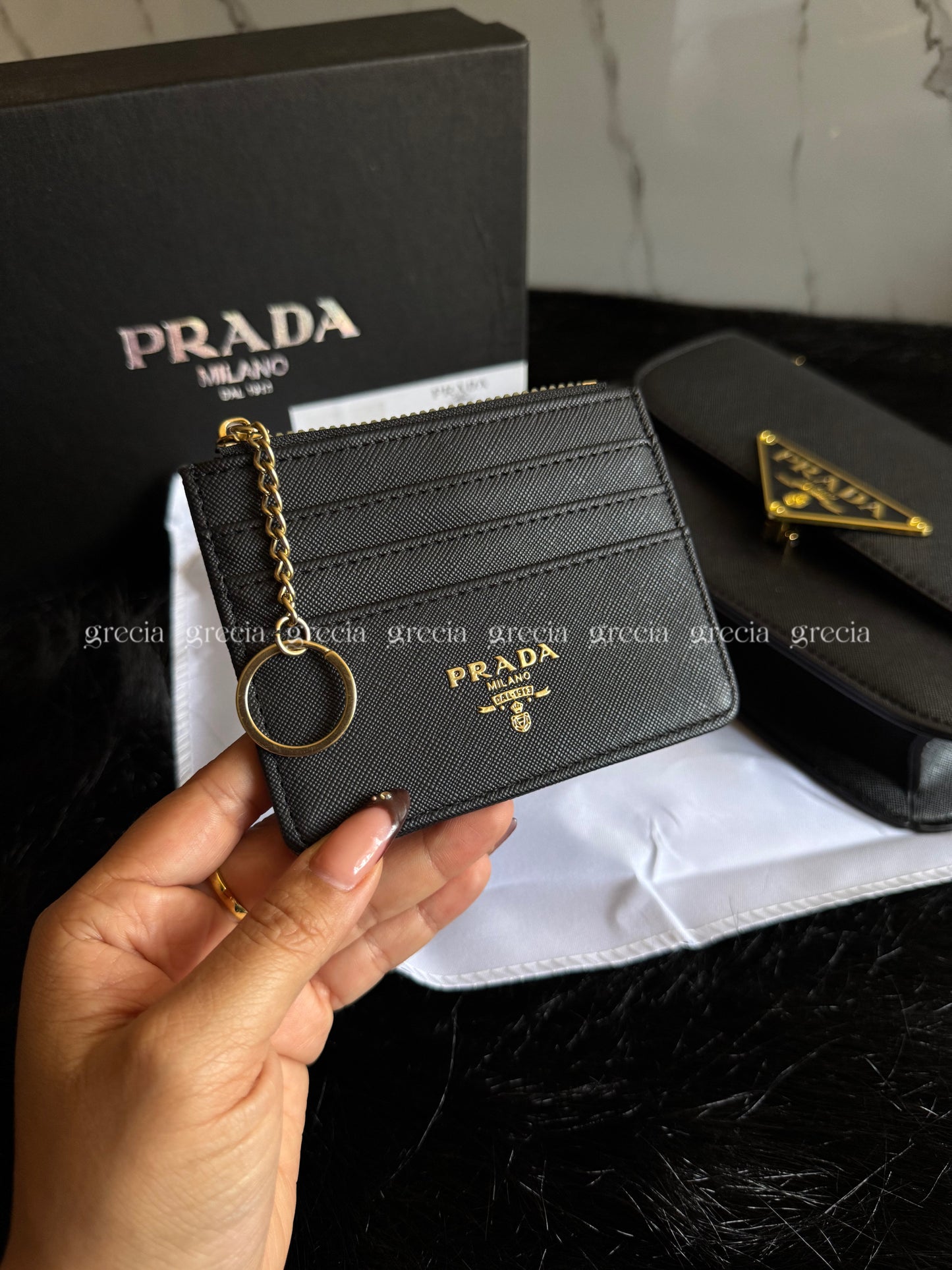 Tarjetero Prada