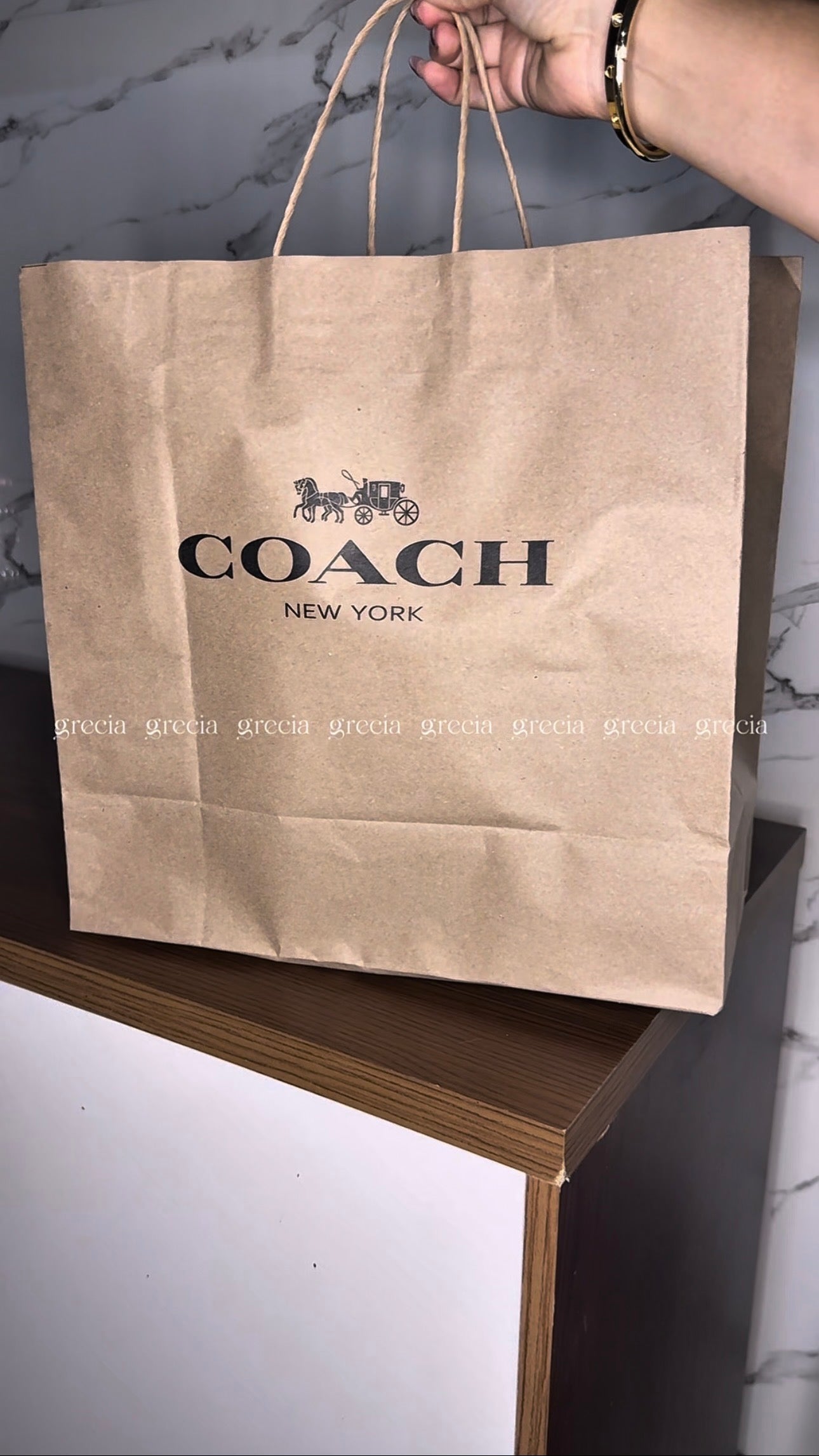 Coach Nolita Cherry rosa