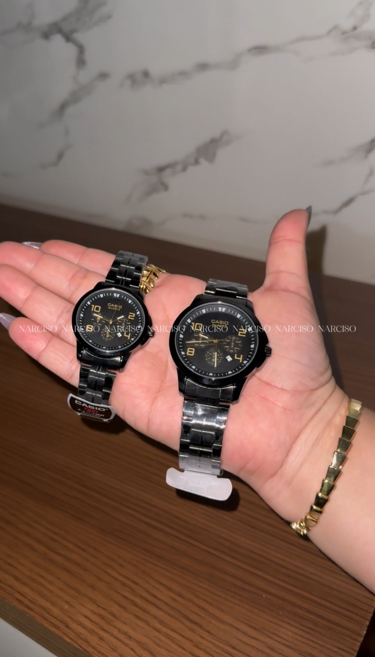 Dúo Casio negro con dorado