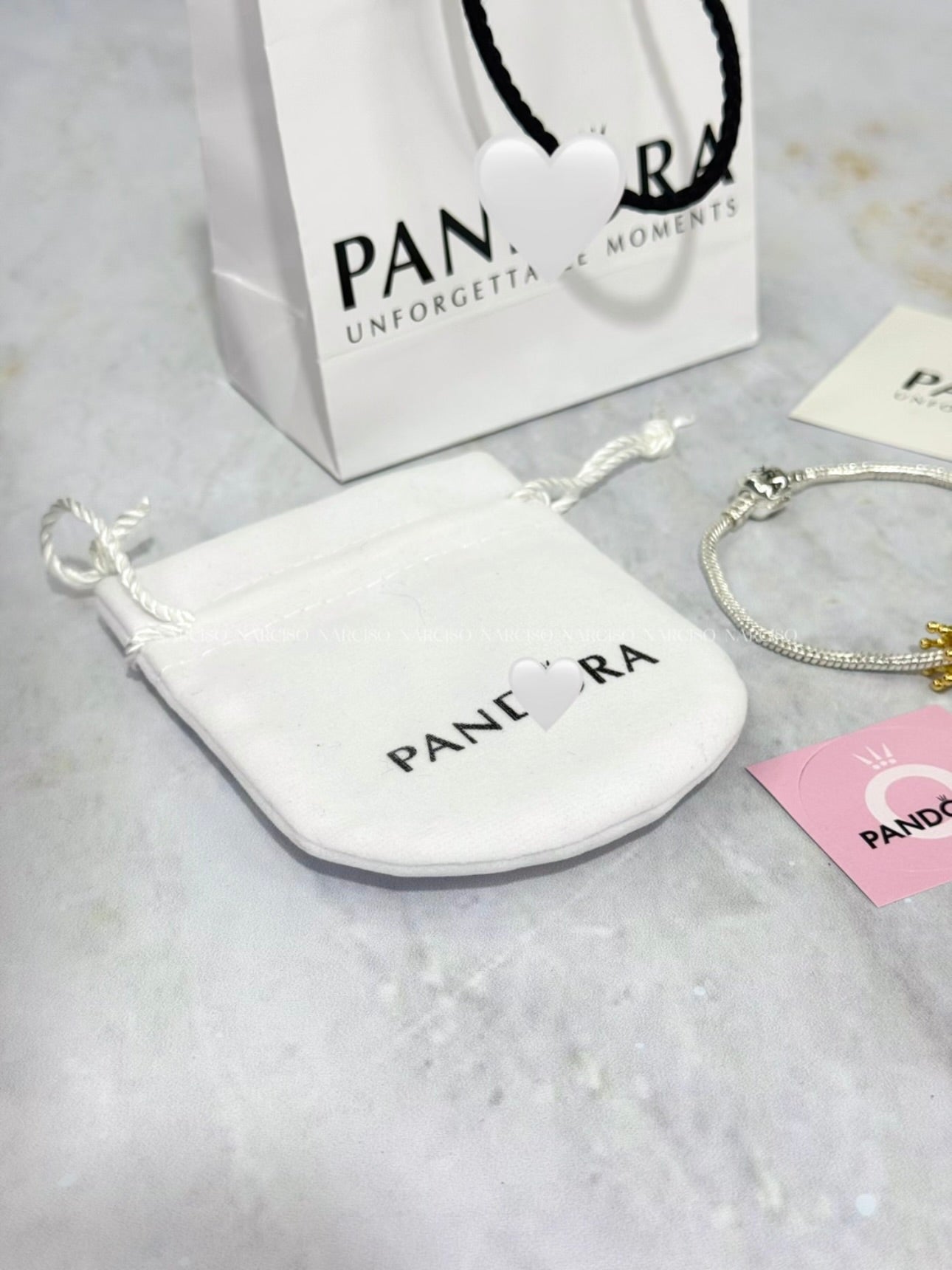 Pandora rosado, plateado y dorado