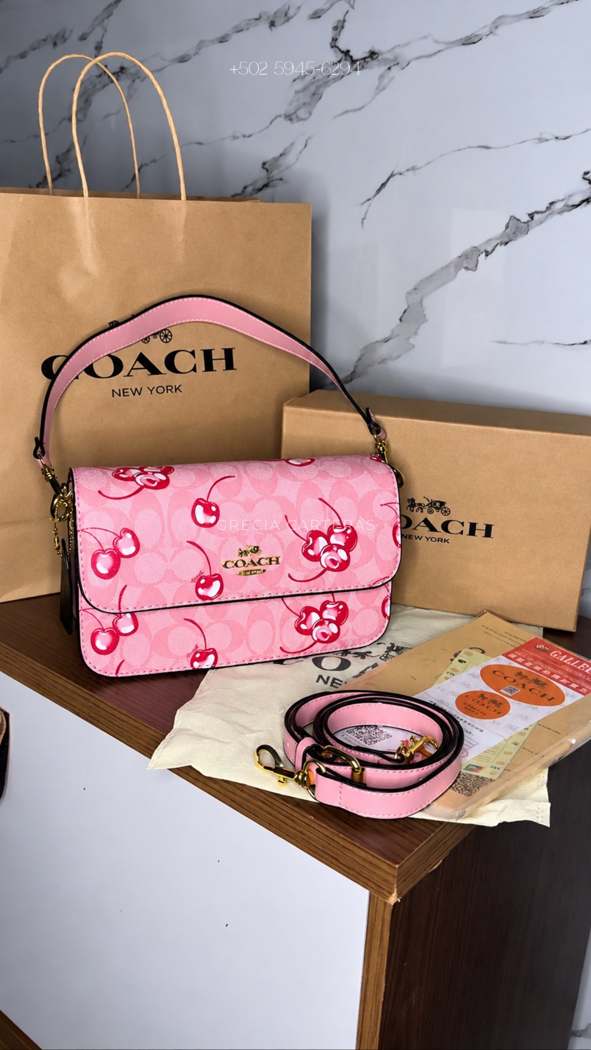 Coach Nolita Cherry rosa