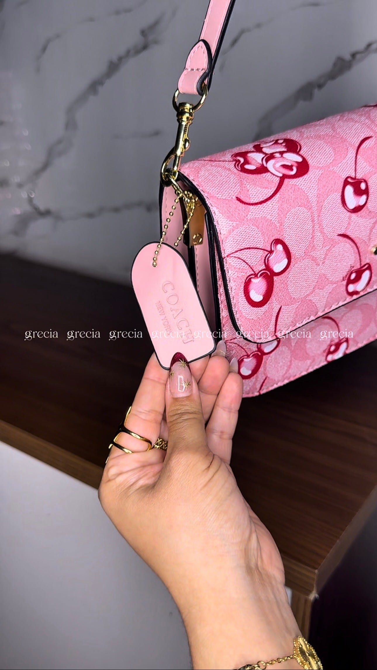 Coach Nolita Cherry rosa