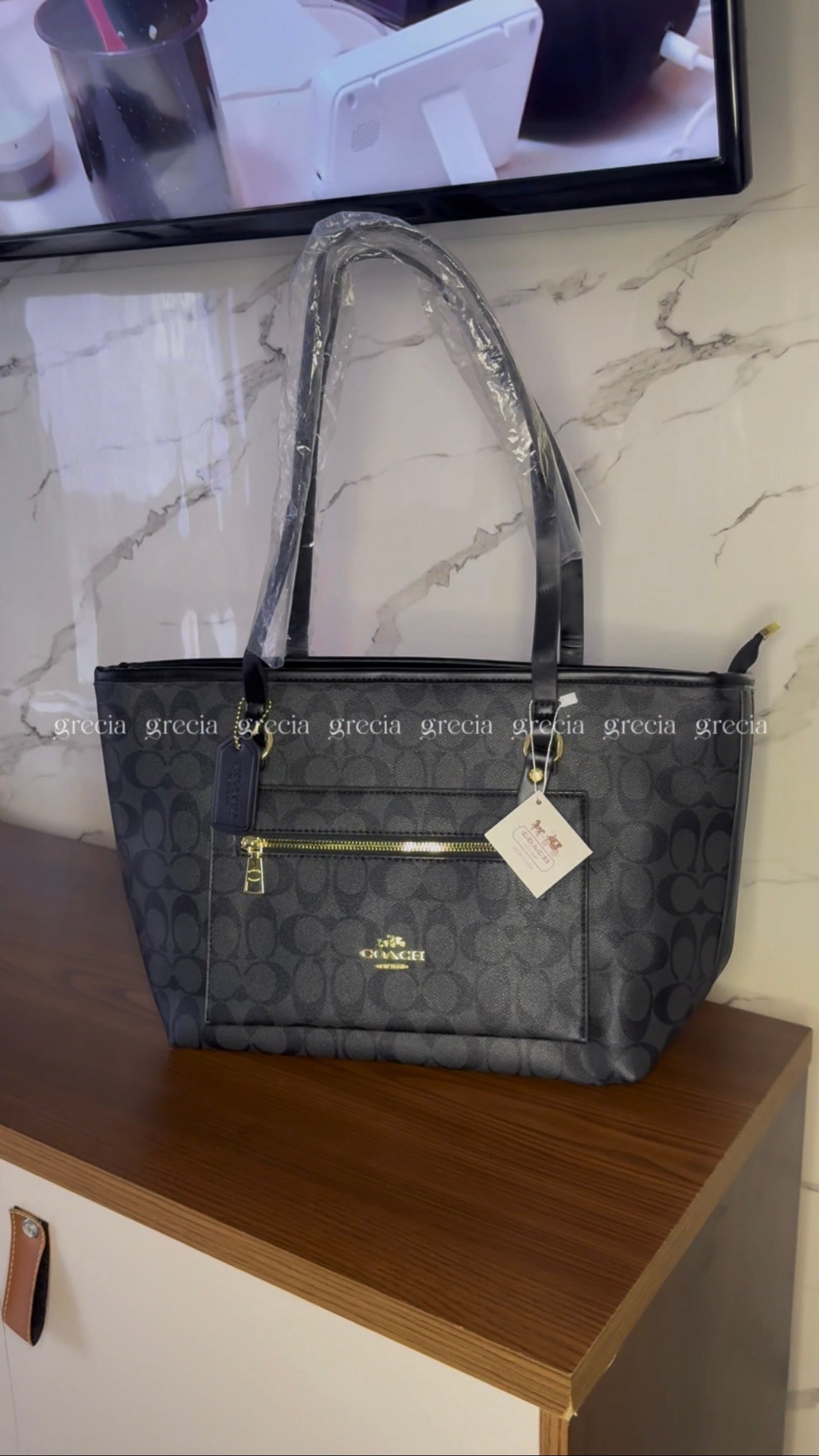 Coach XL negra