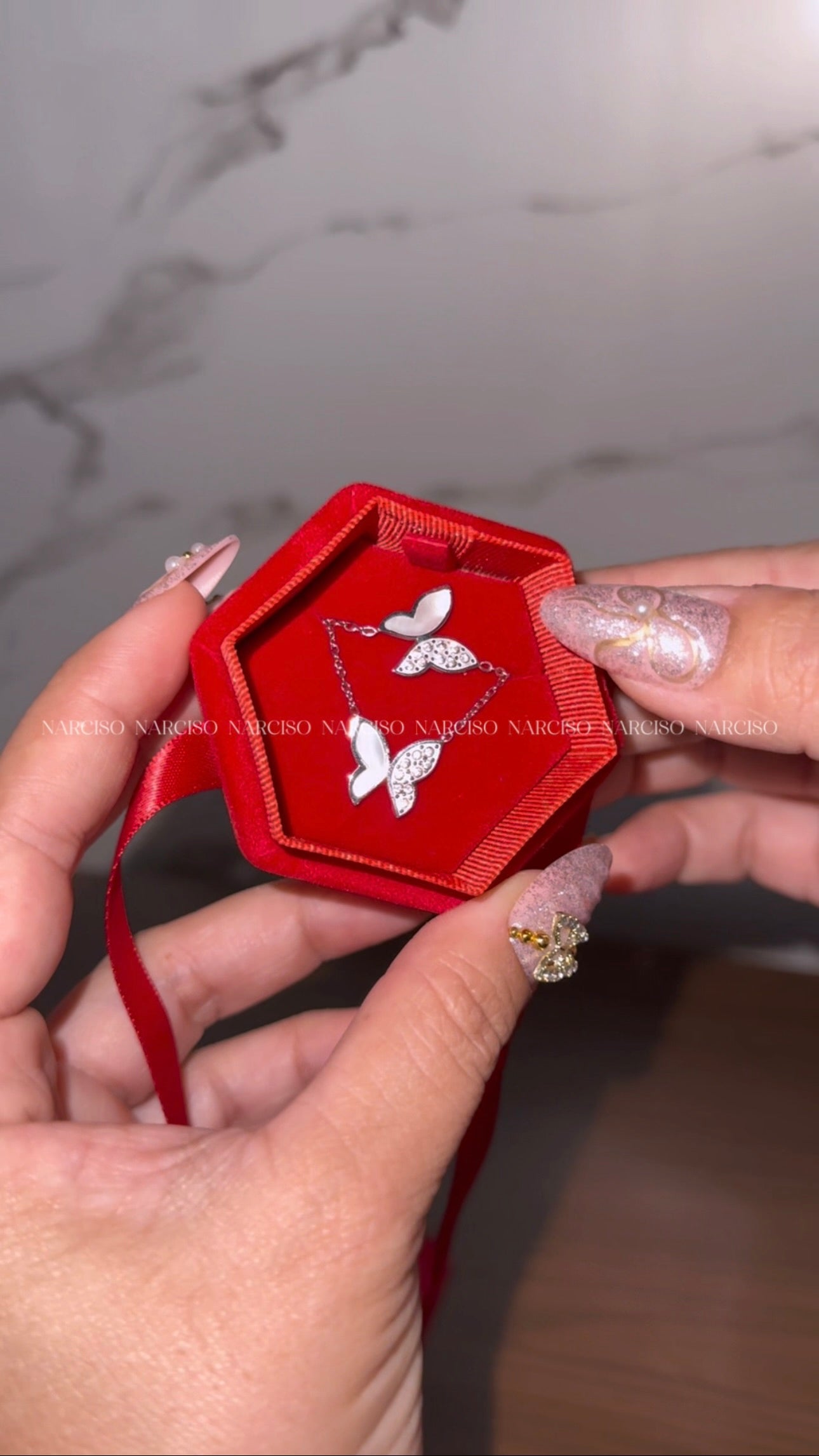 Collar y pulsera mariposas plateado