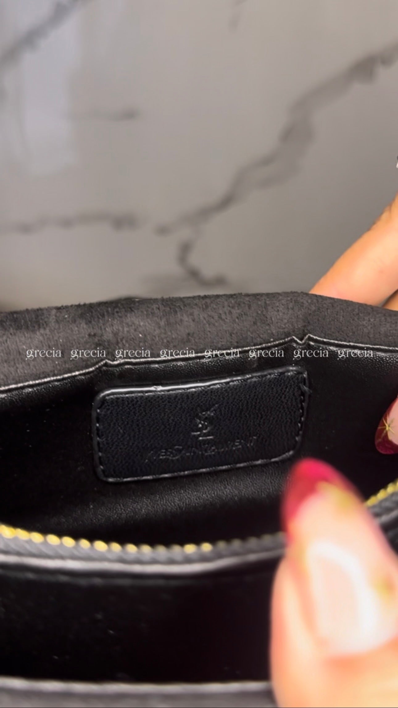 YSL negra con dorado