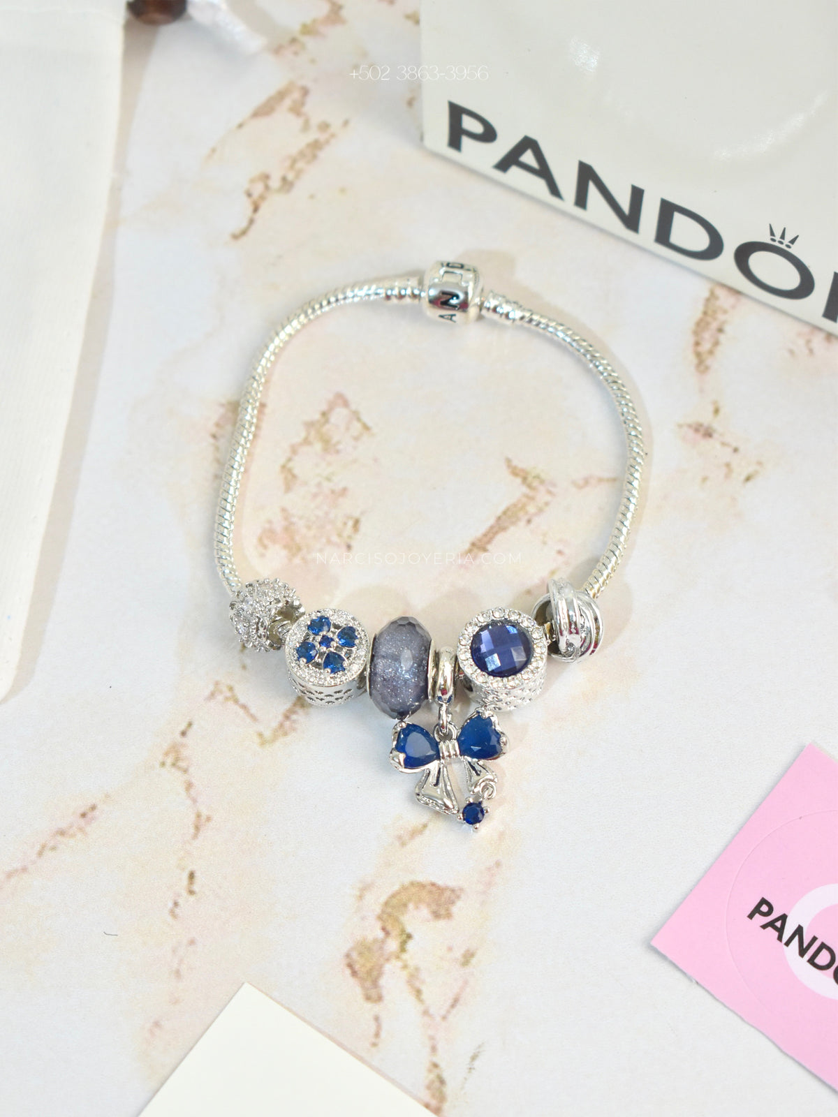 Pandora azul con moñita