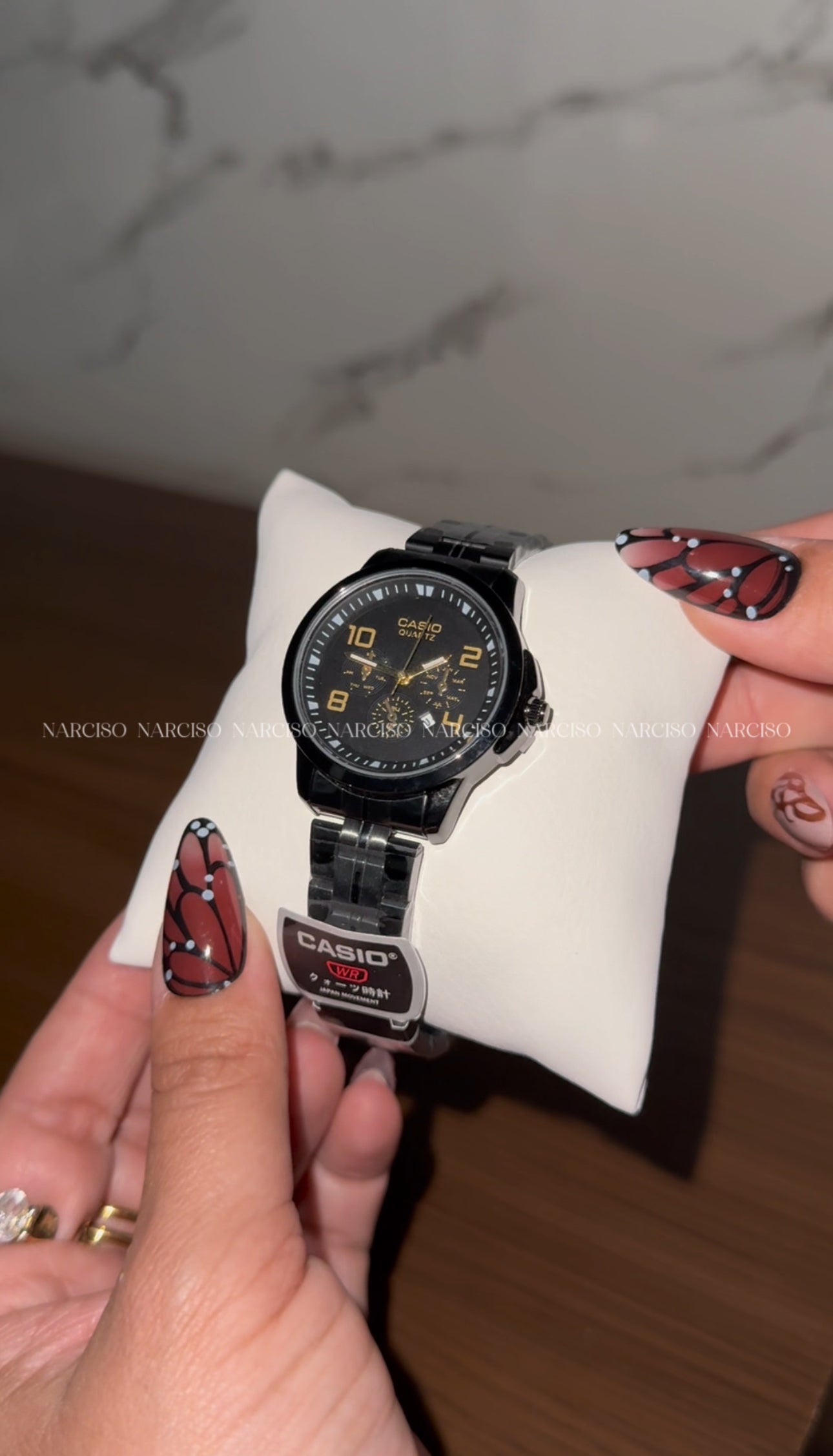 Dúo Casio negro con dorado