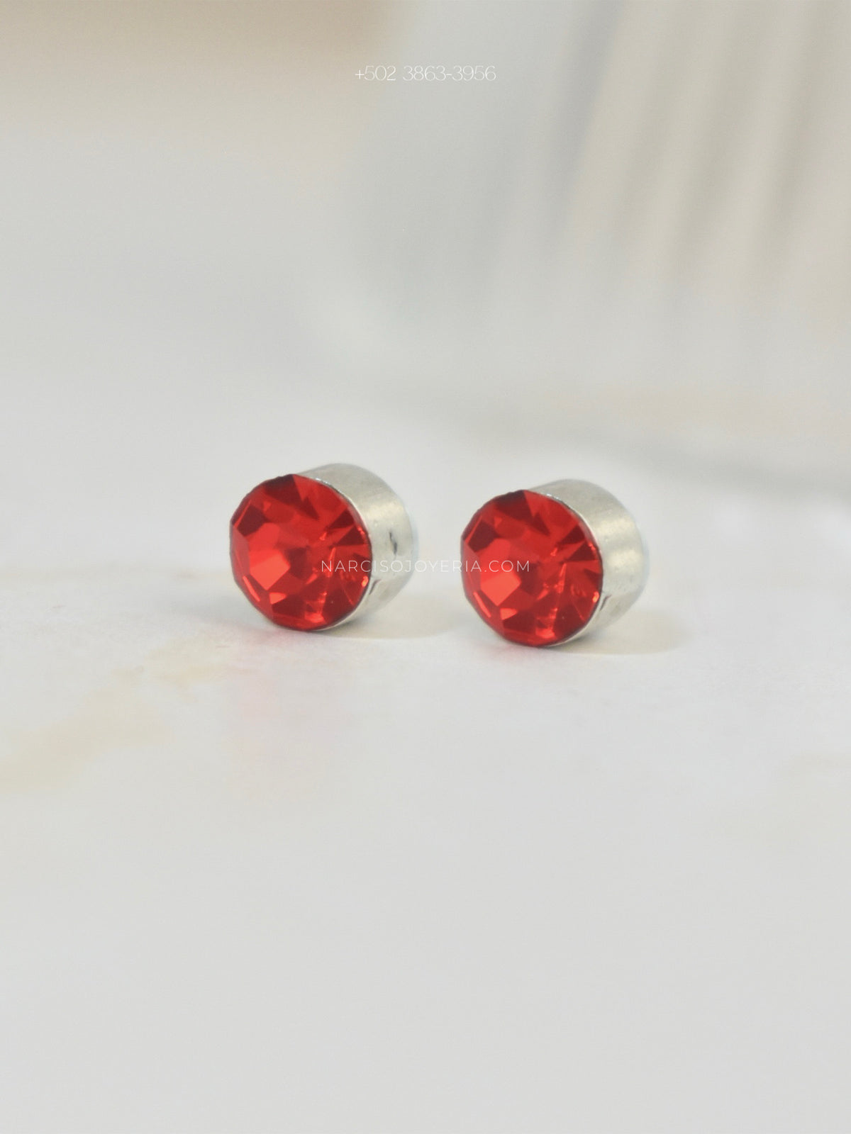 Piercing de imán rojo