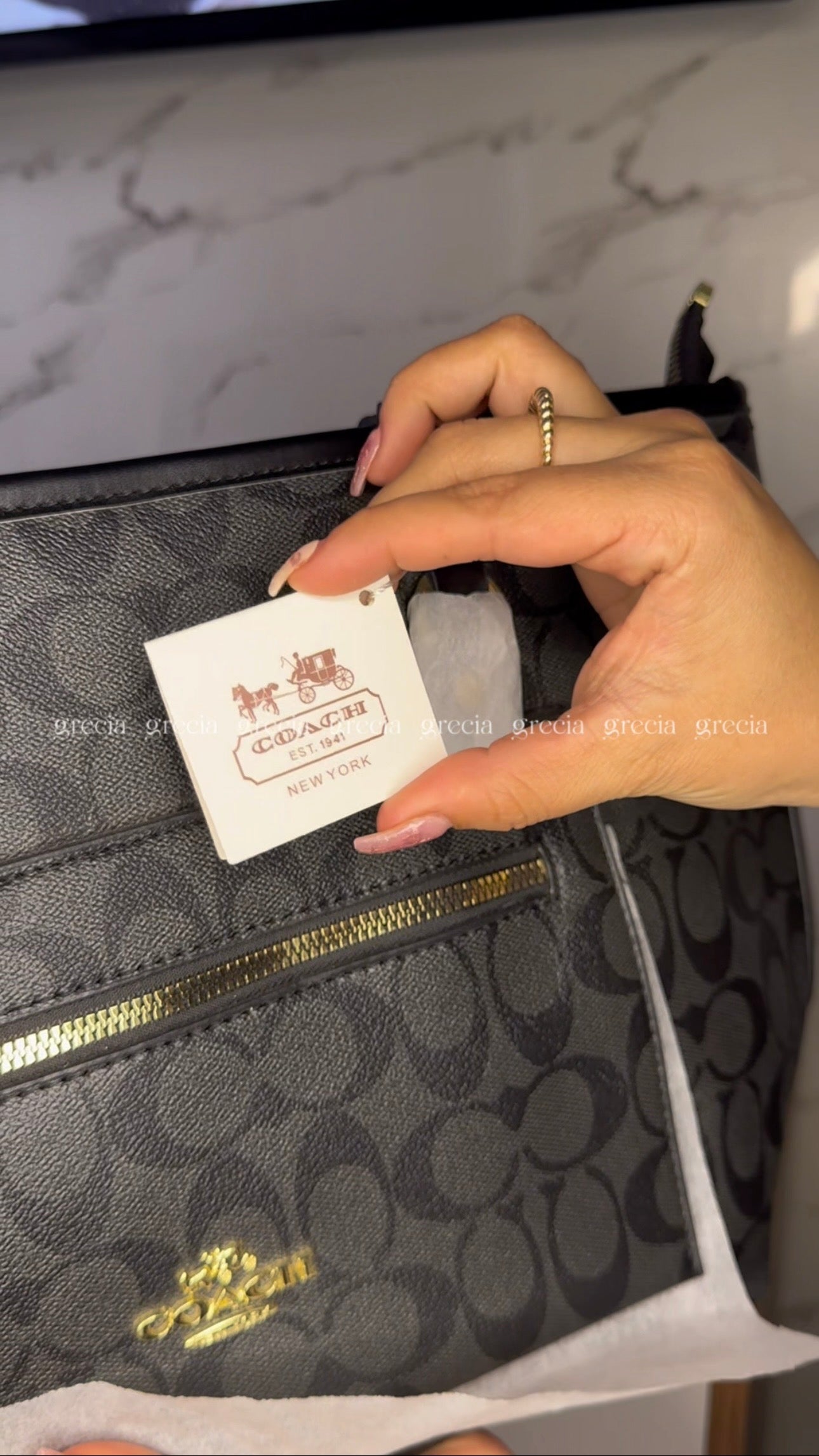 Coach XL negra