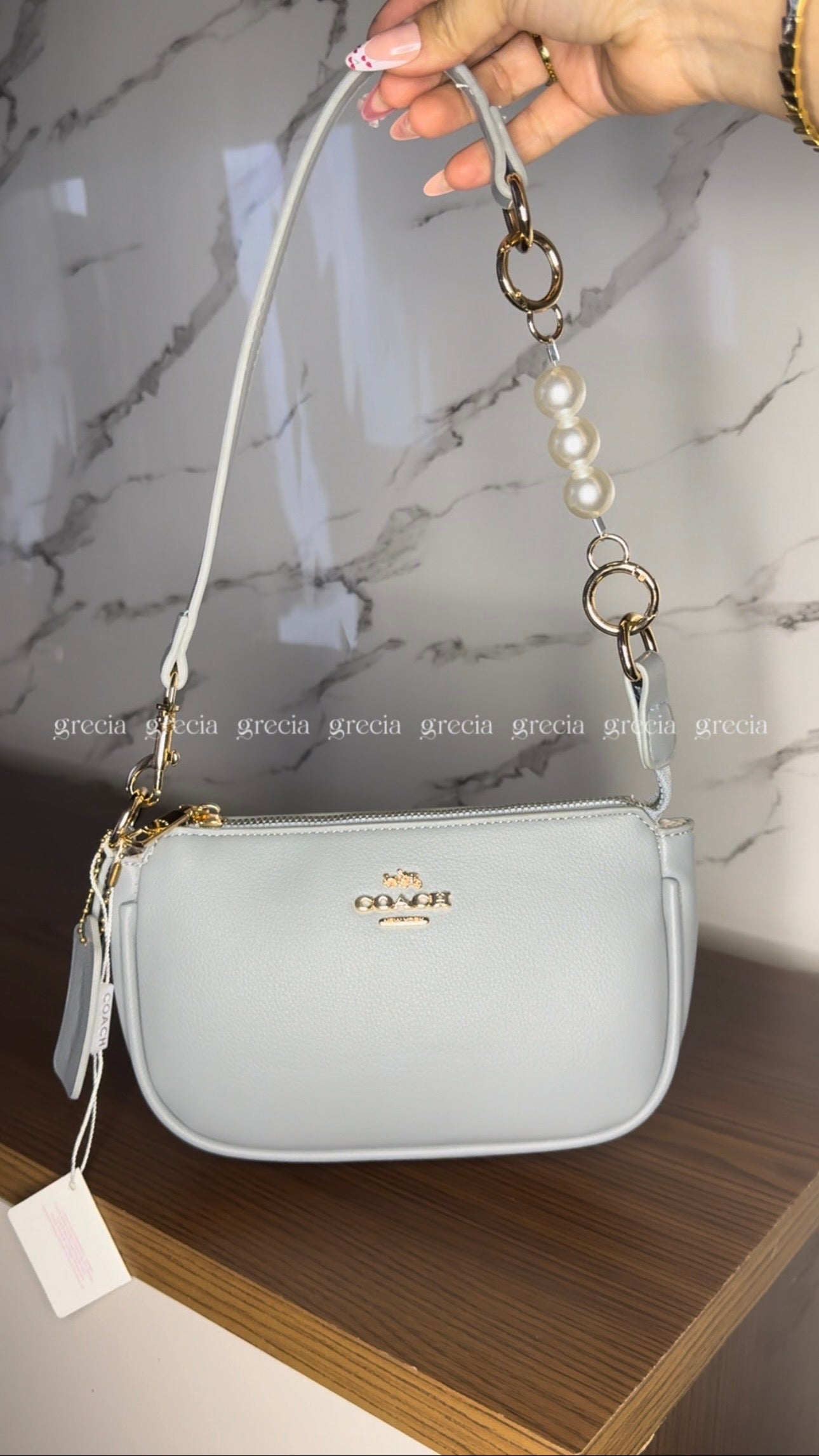 Coach Nolita gris