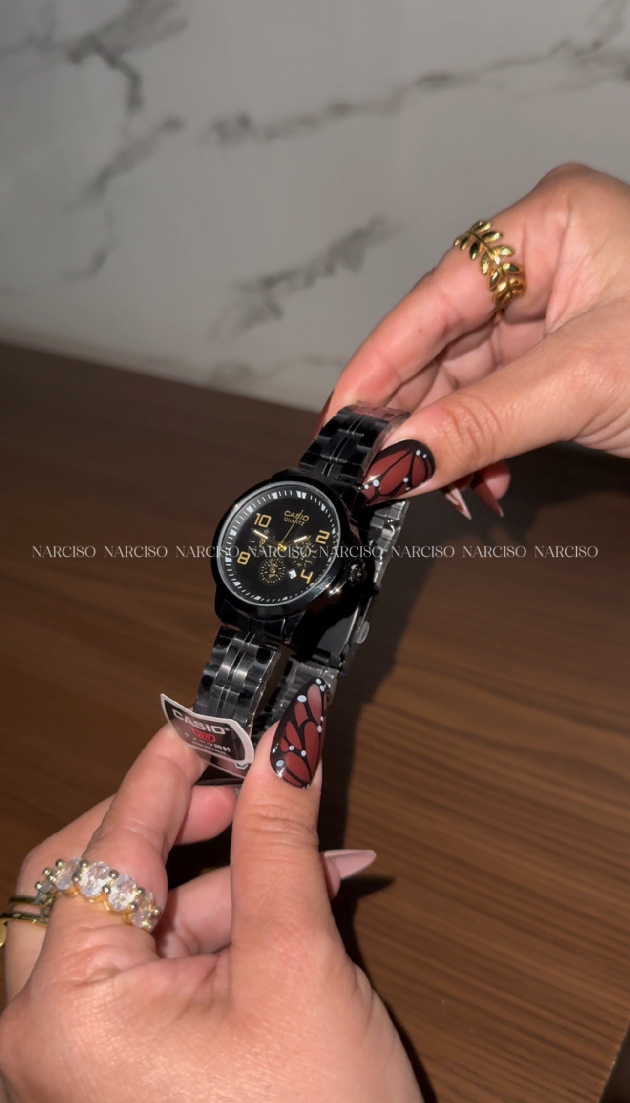 Dúo Casio negro con dorado