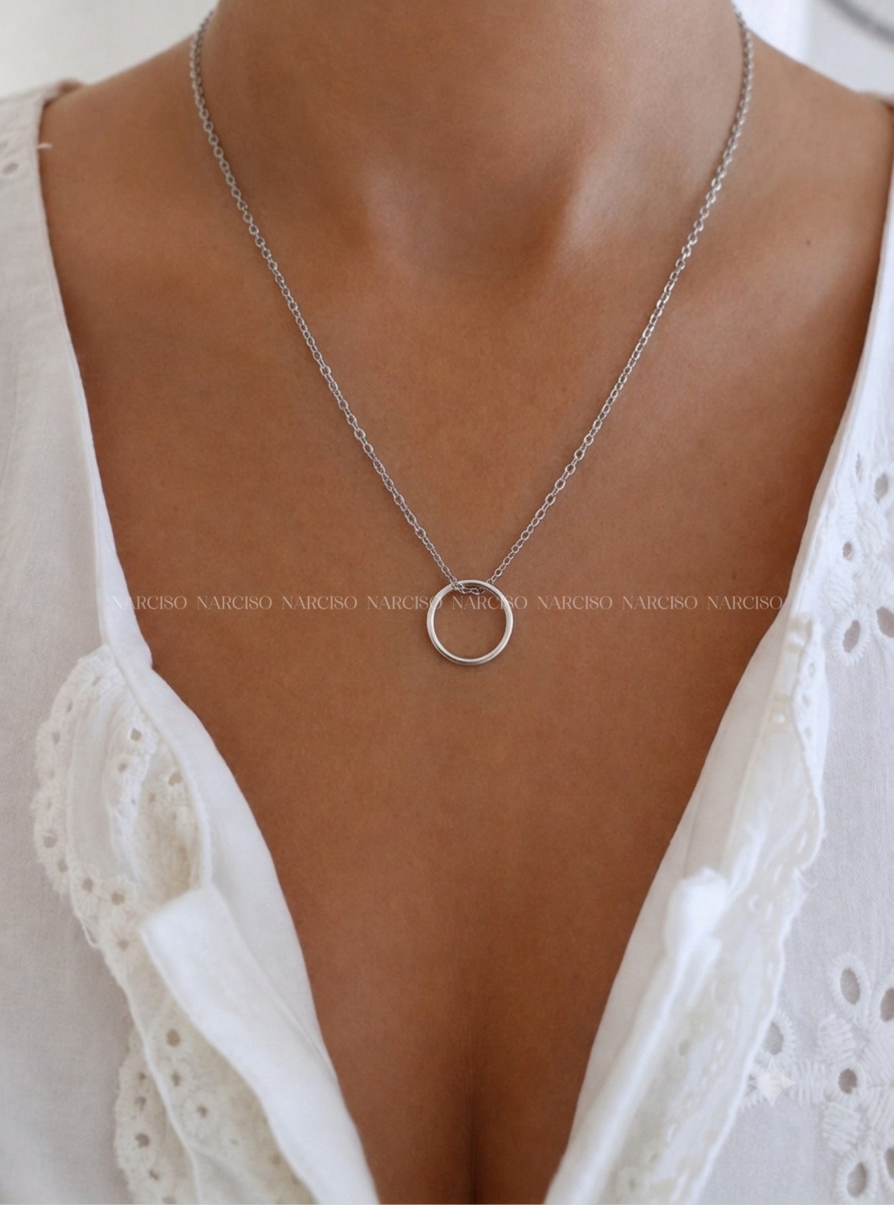 Dúo de anillos en collar