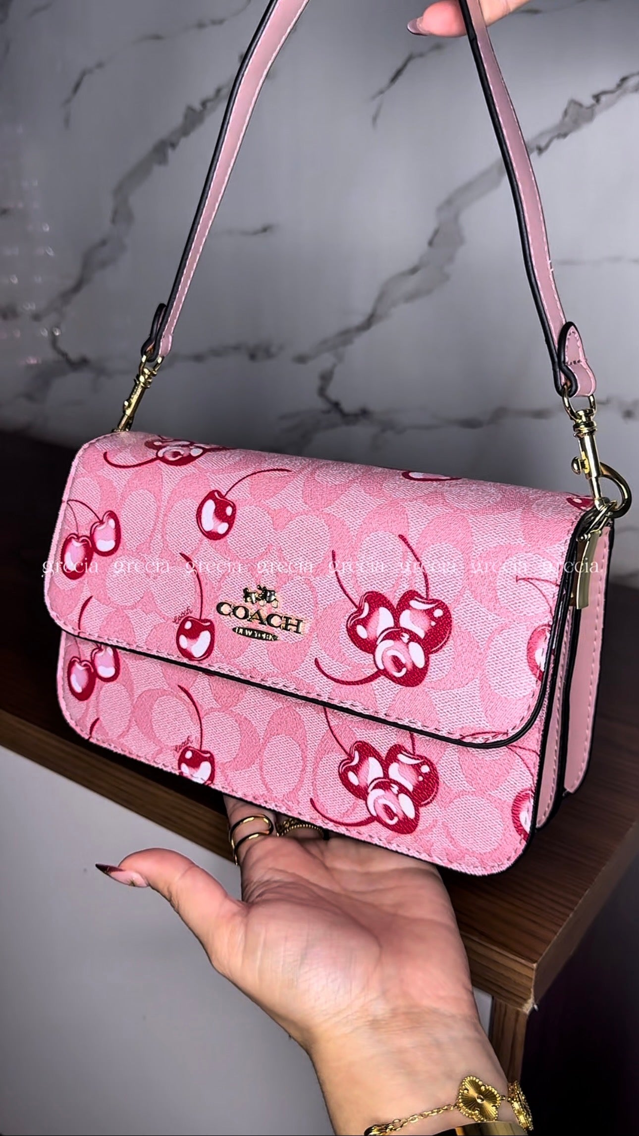 Coach Nolita Cherry rosa