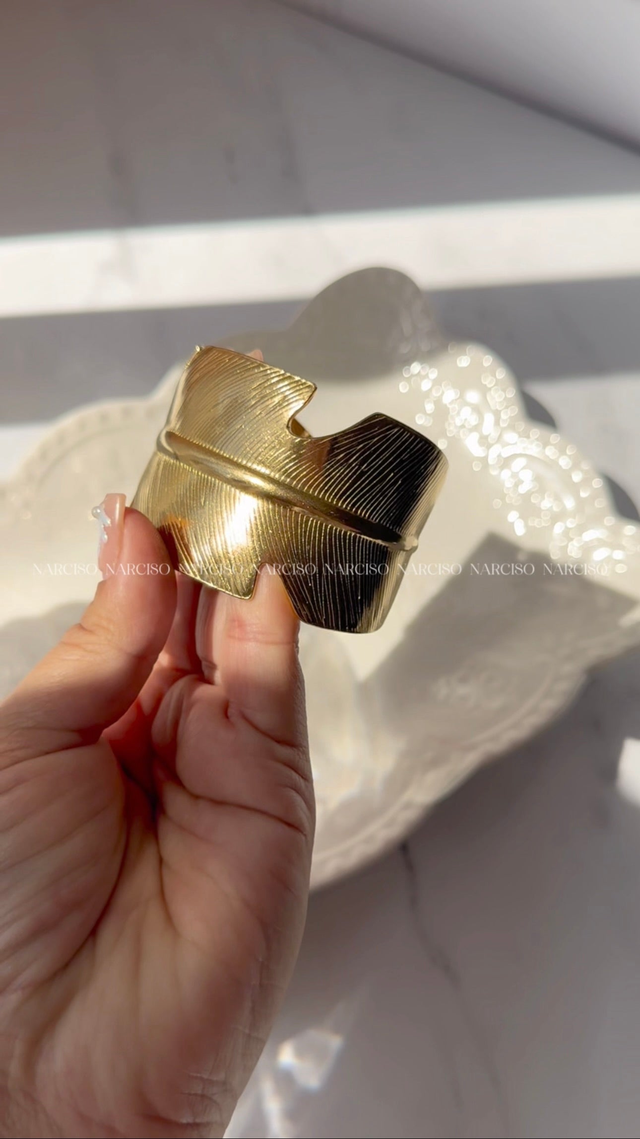 Brazalete pluma