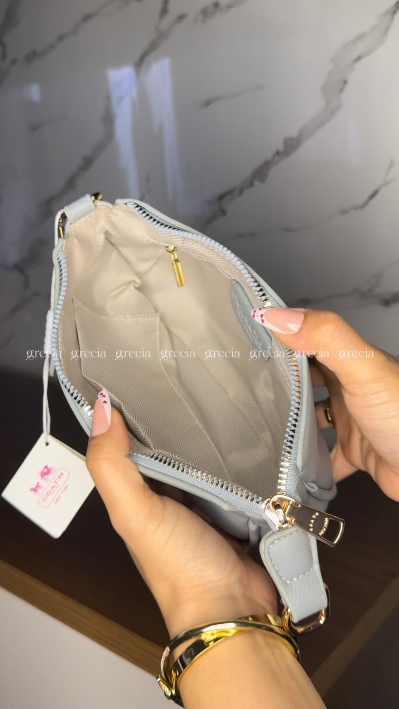 Coach Nolita gris
