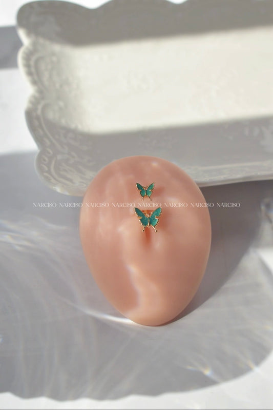 Piercing ombligo mariposa