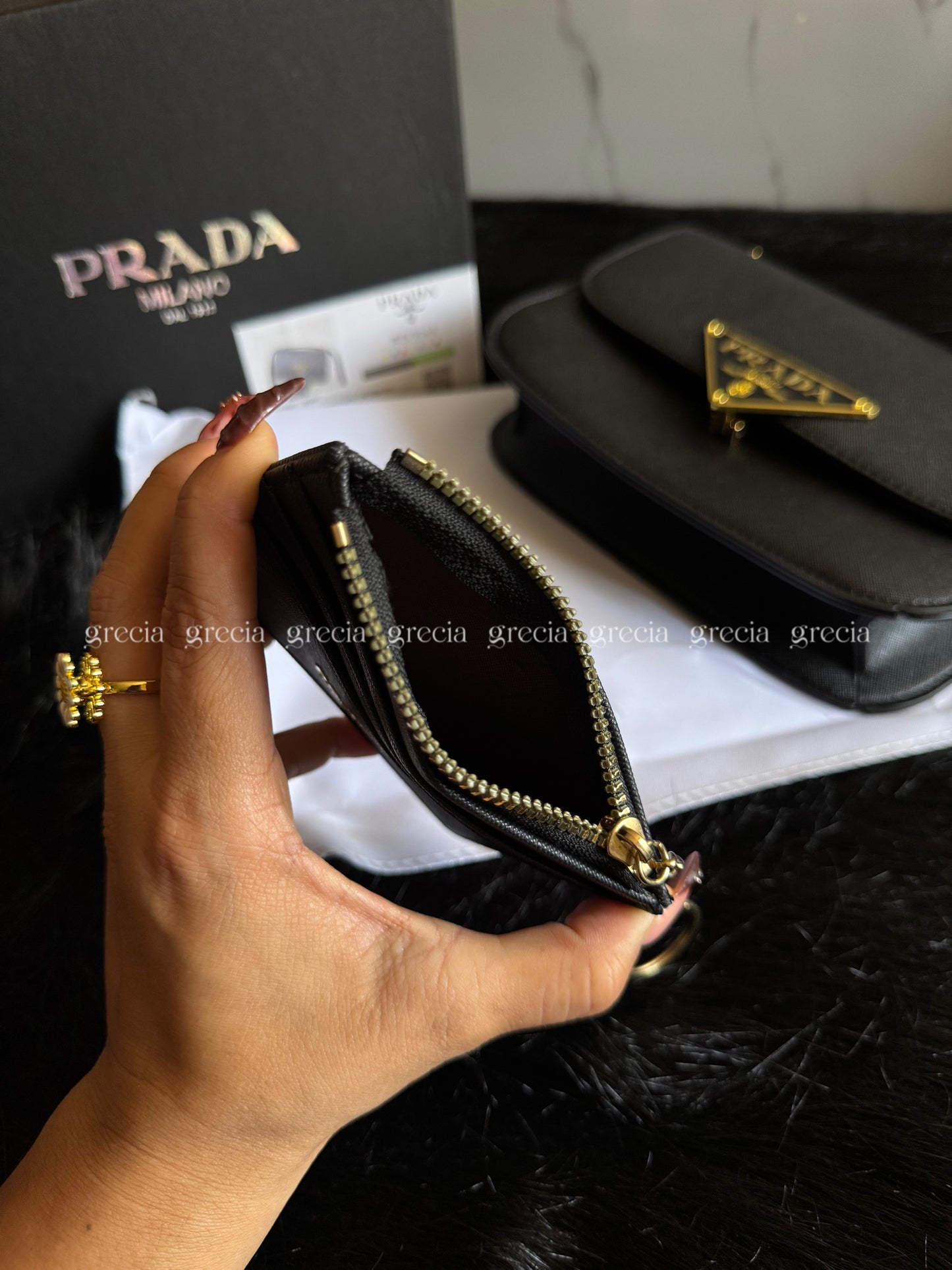Tarjetero Prada