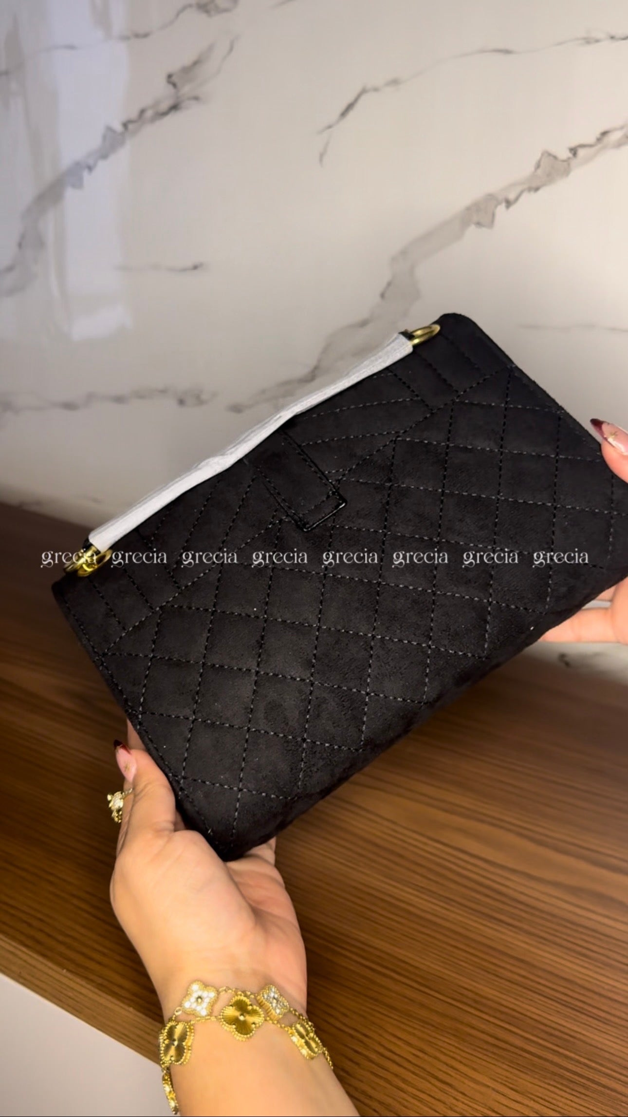 YSL negra con dorado