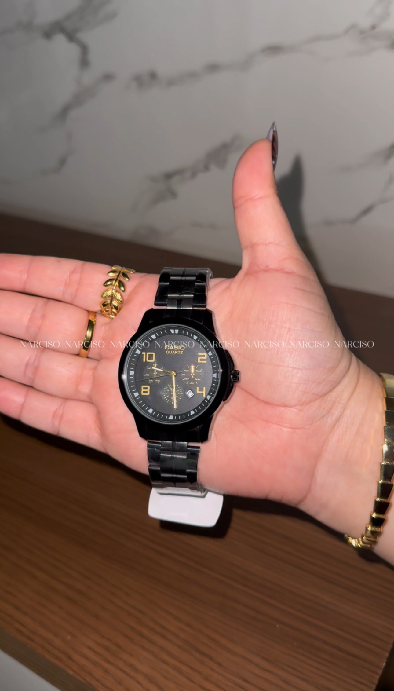 Dúo Casio negro con dorado