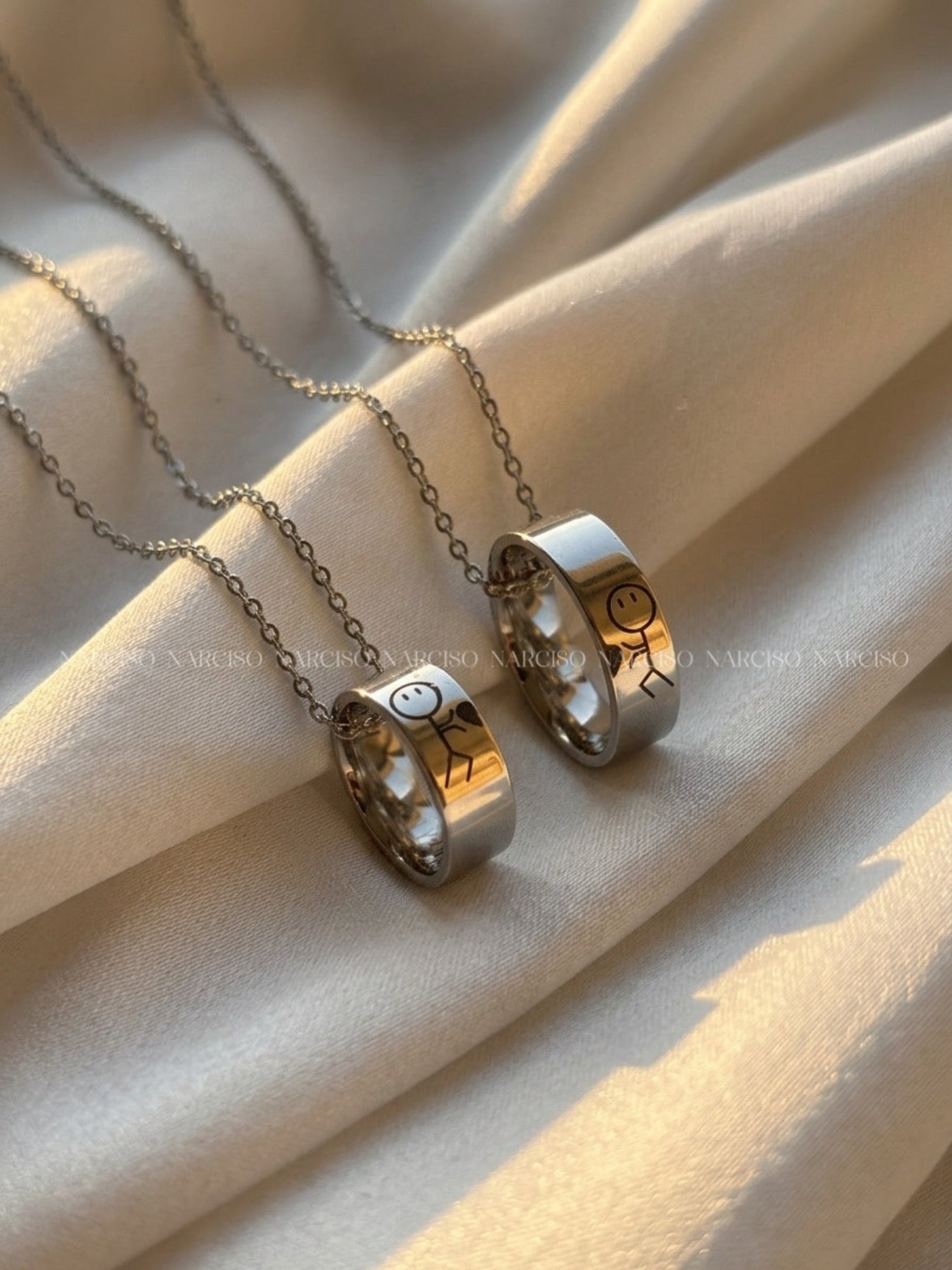 Dúo de anillos en collar