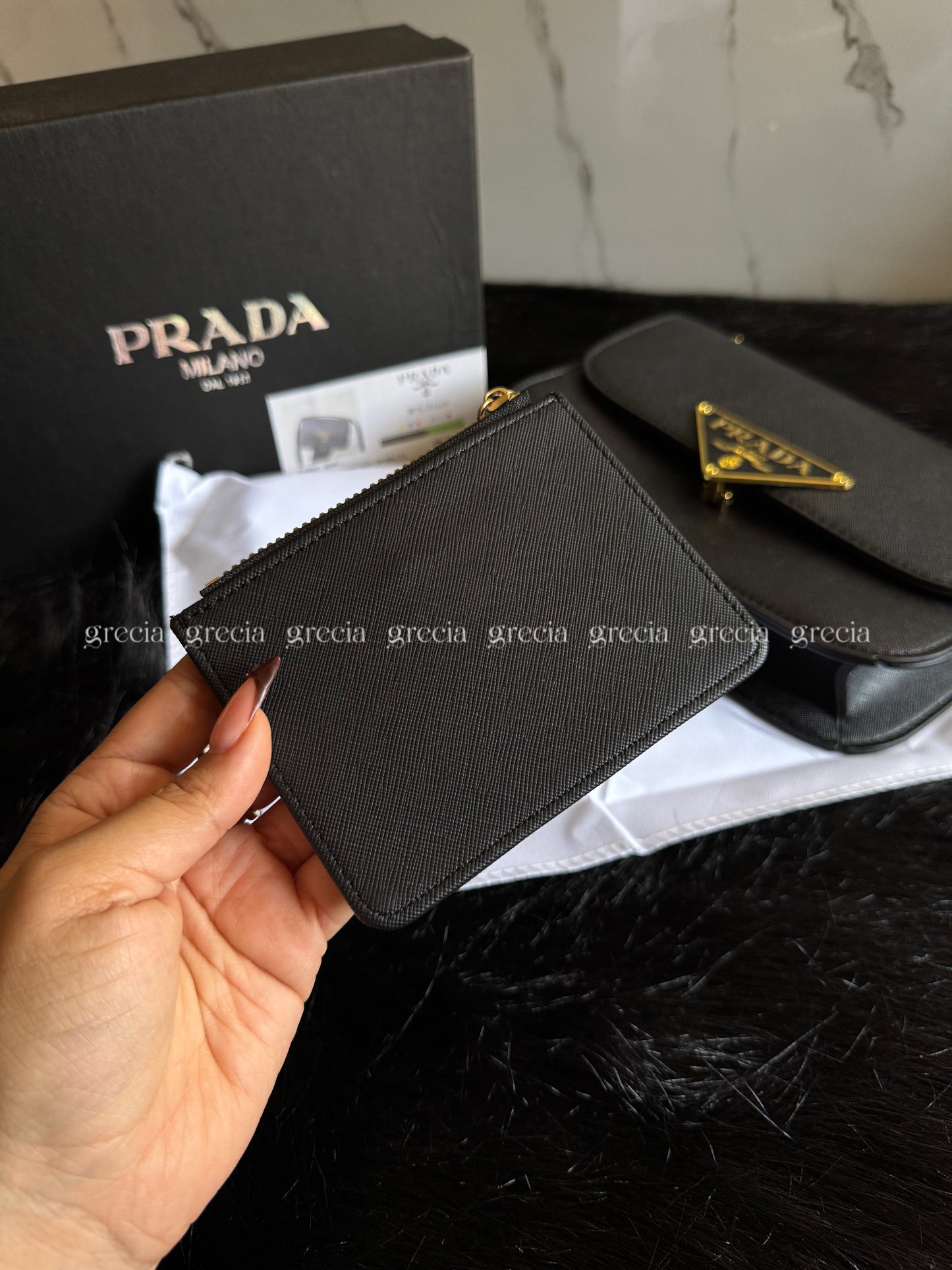Tarjetero Prada