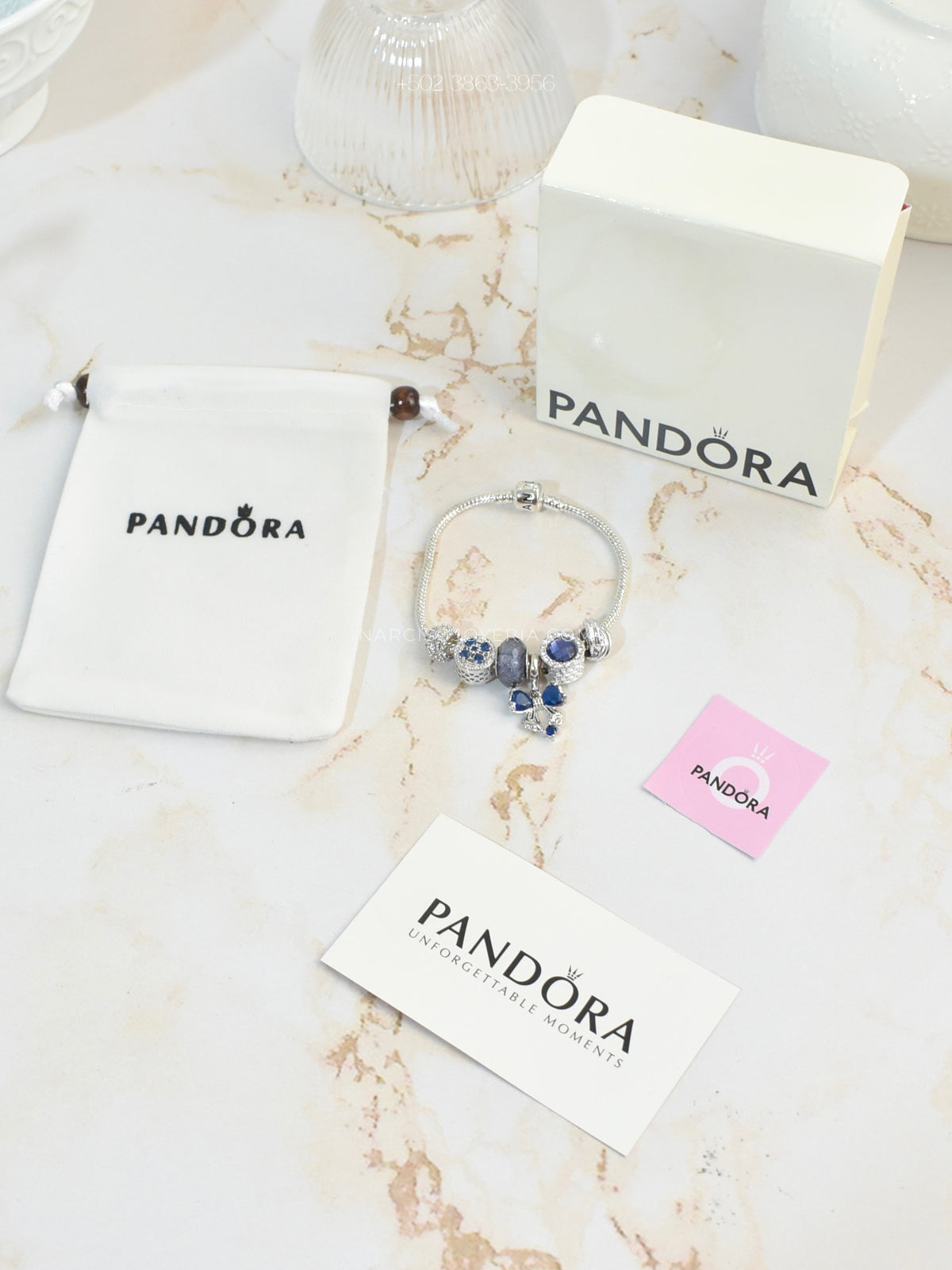 Pandora azul con moñita