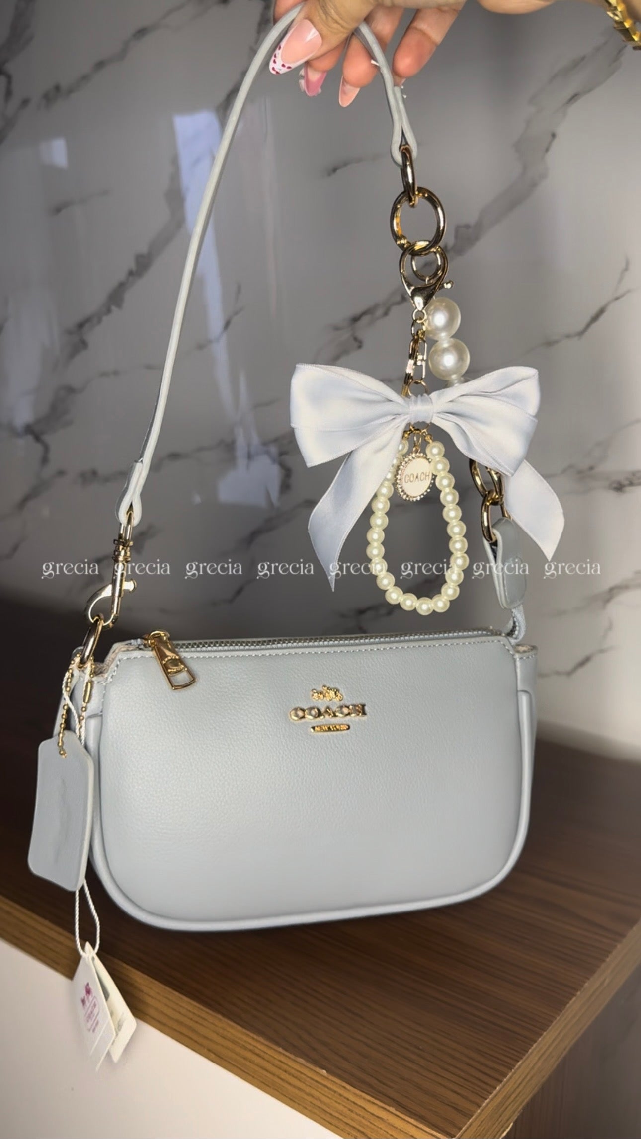 Coach Nolita gris