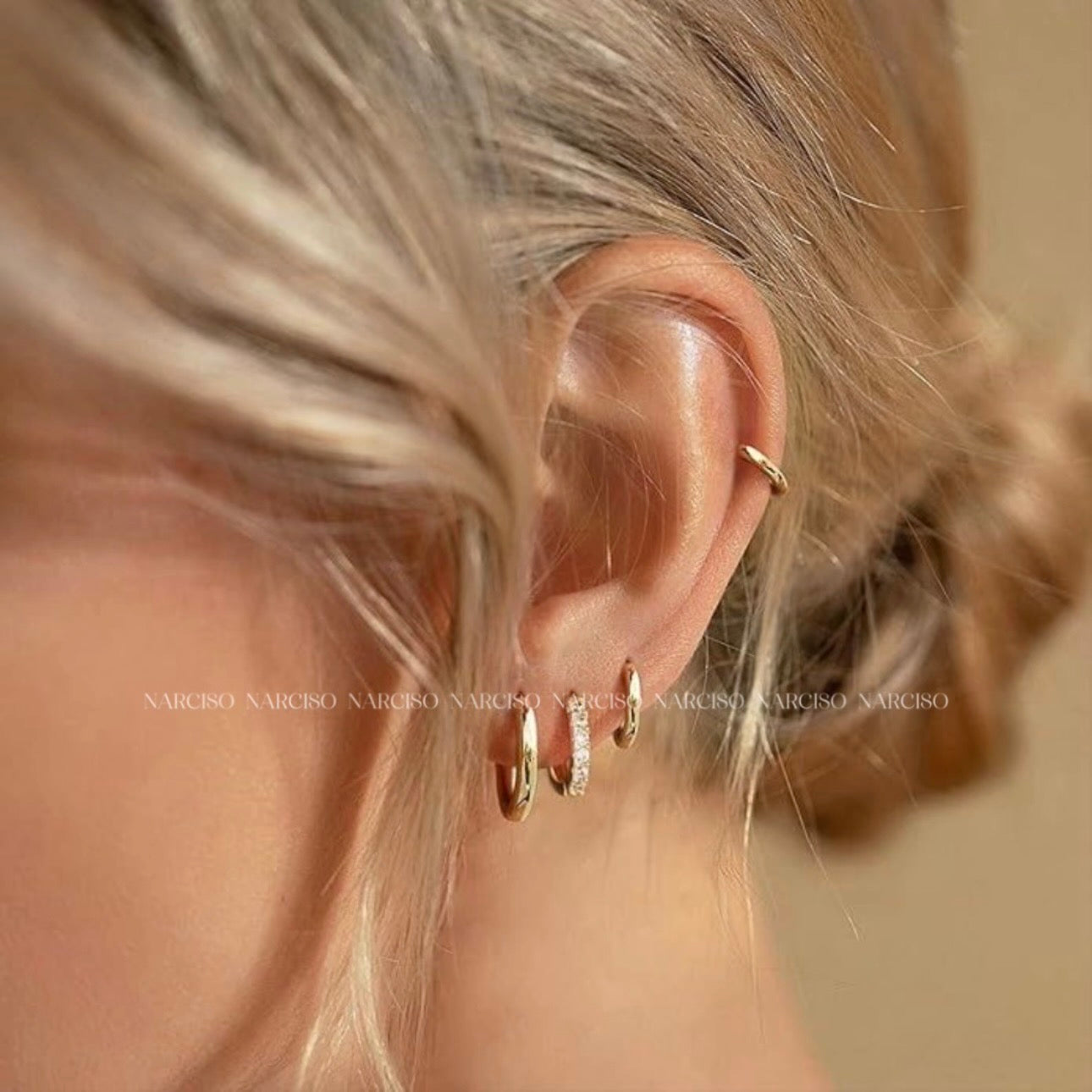 Trío de piercings