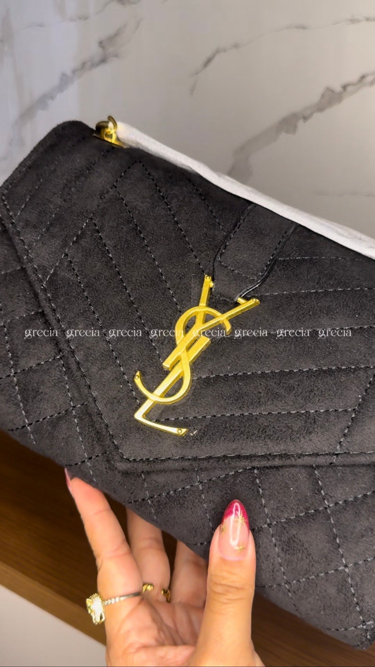 YSL negra con dorado
