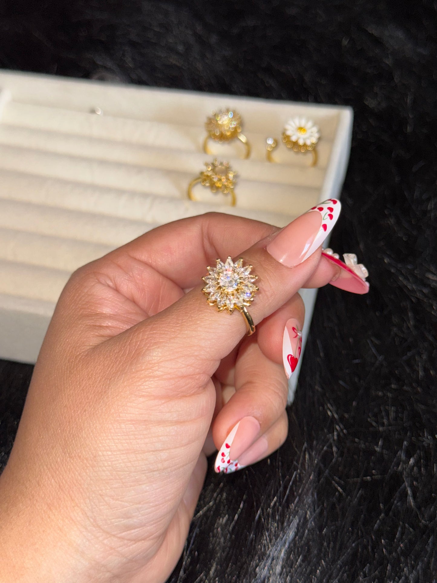 Anillo girasol giratorio