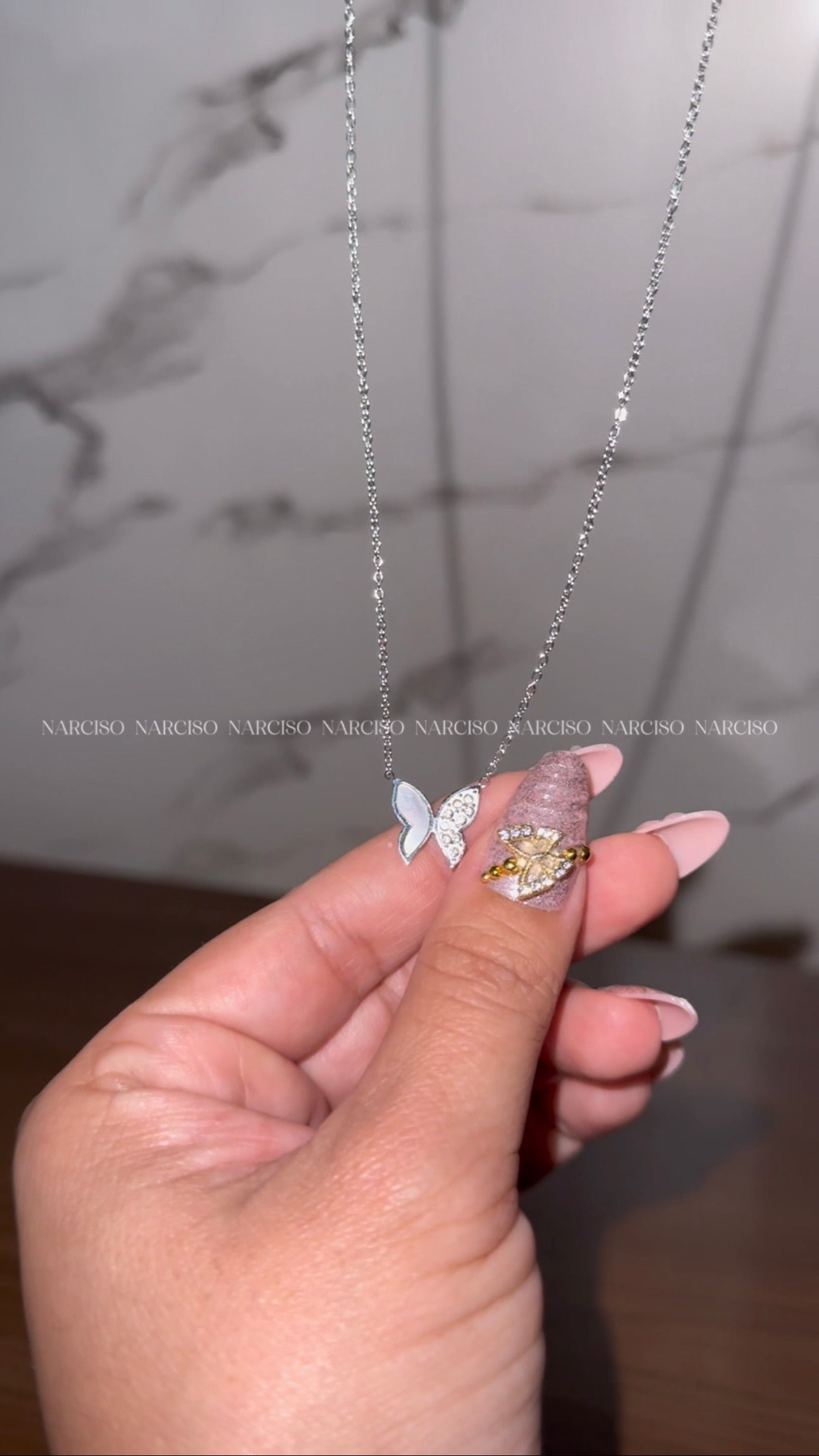 Collar y pulsera mariposas plateado