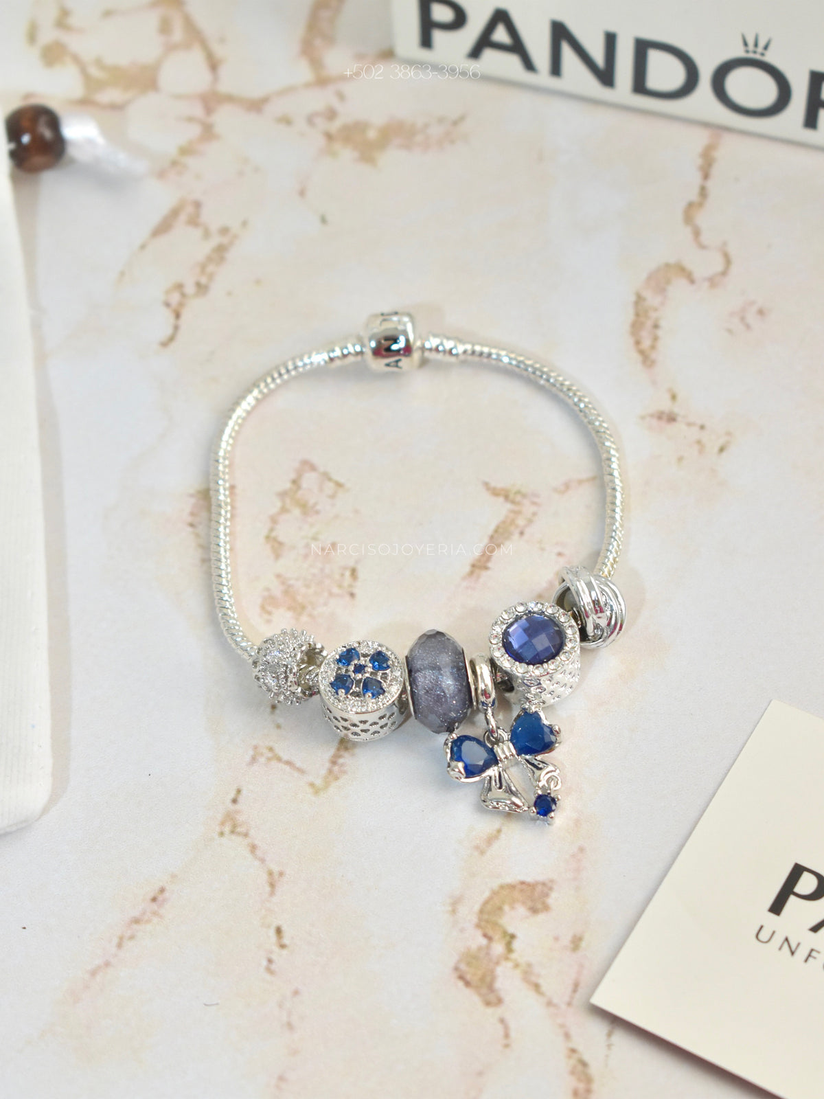 Pandora azul con moñita