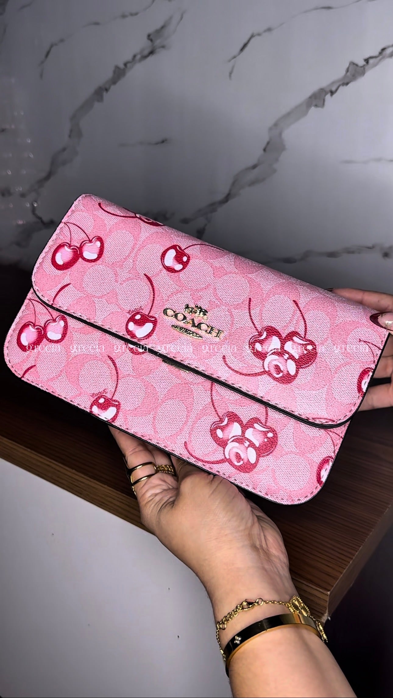 Coach Nolita Cherry rosa