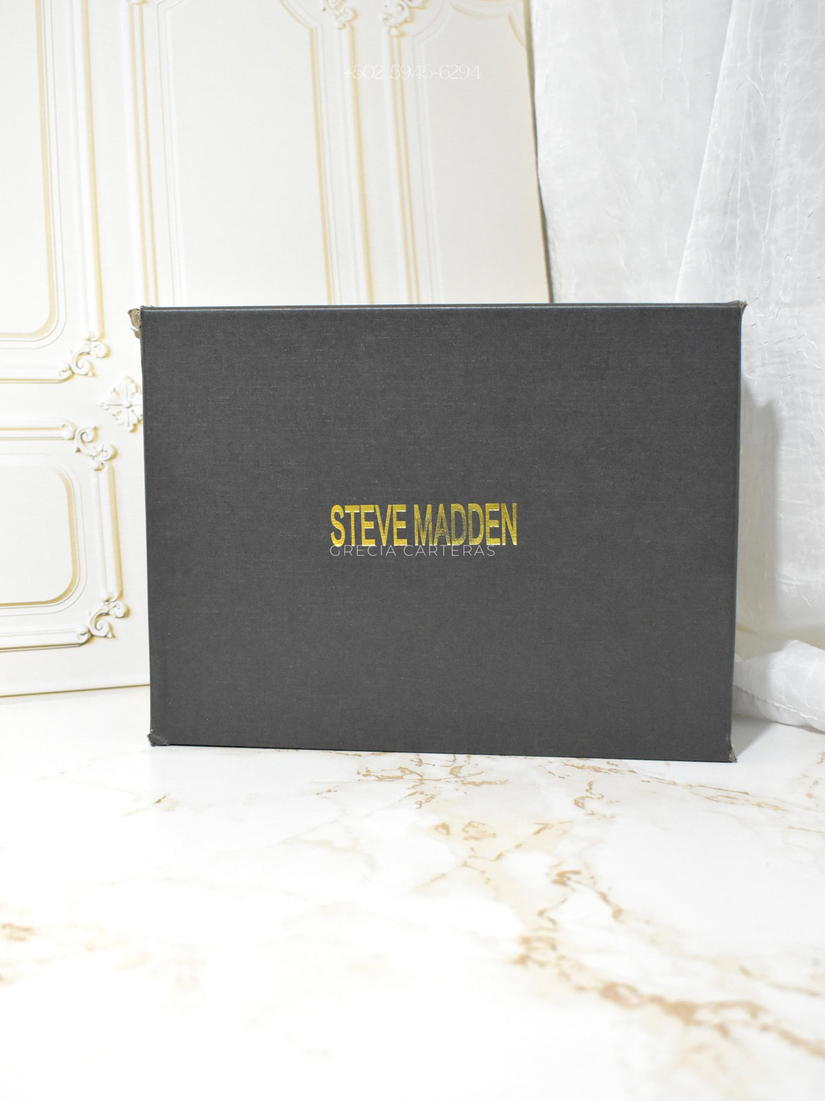 Steve Madden negra con plateado