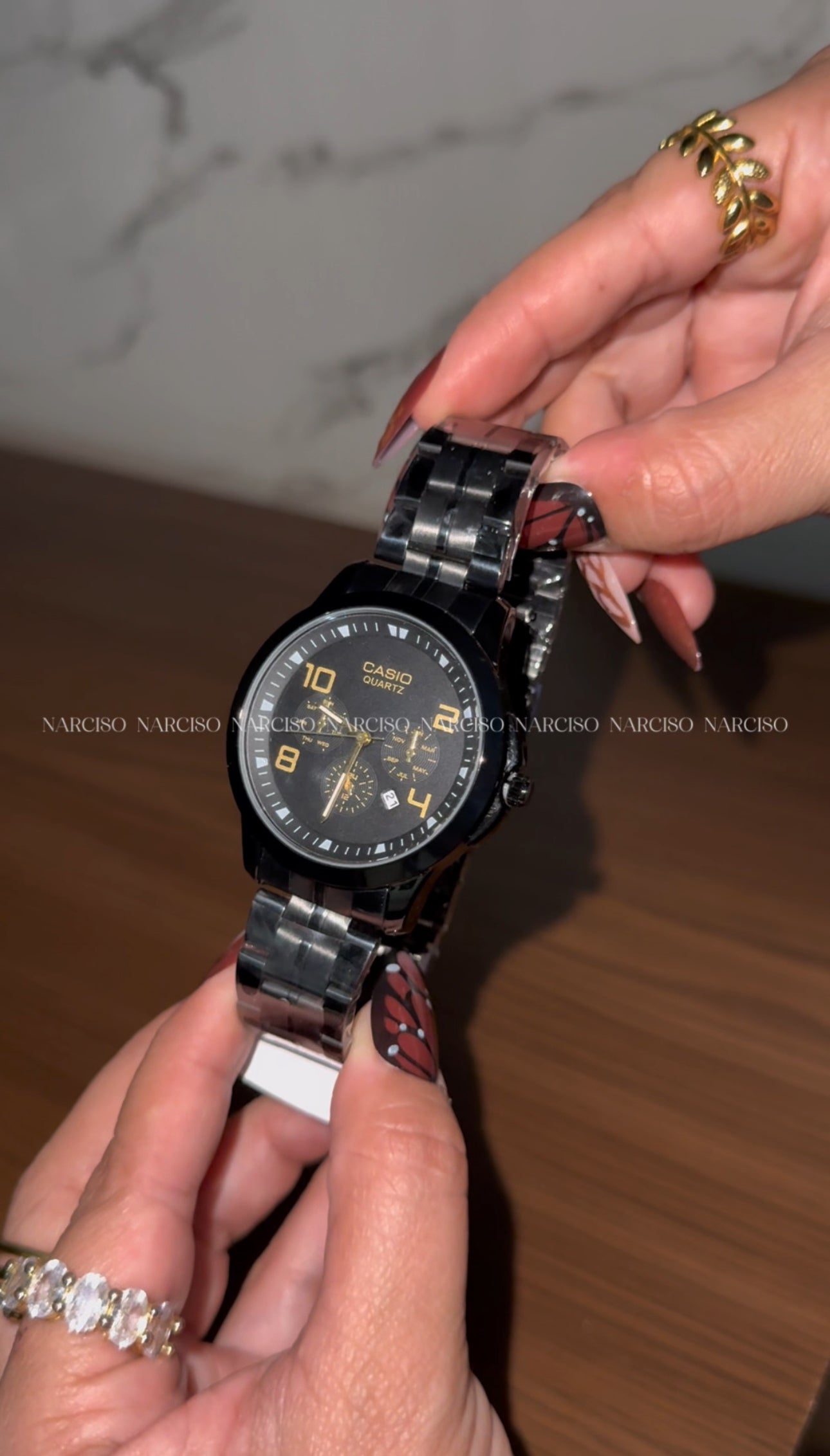 Dúo Casio negro con dorado