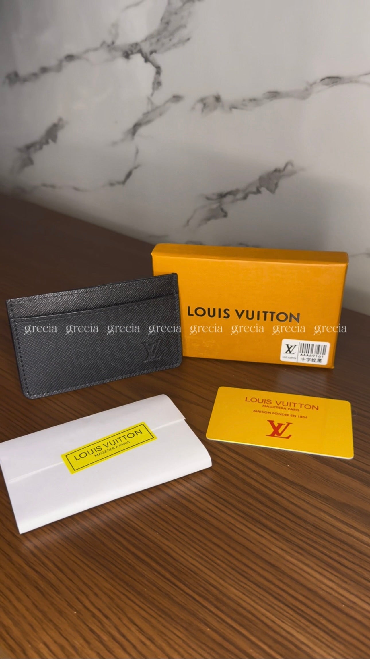Tarjetero Louis Vuitton