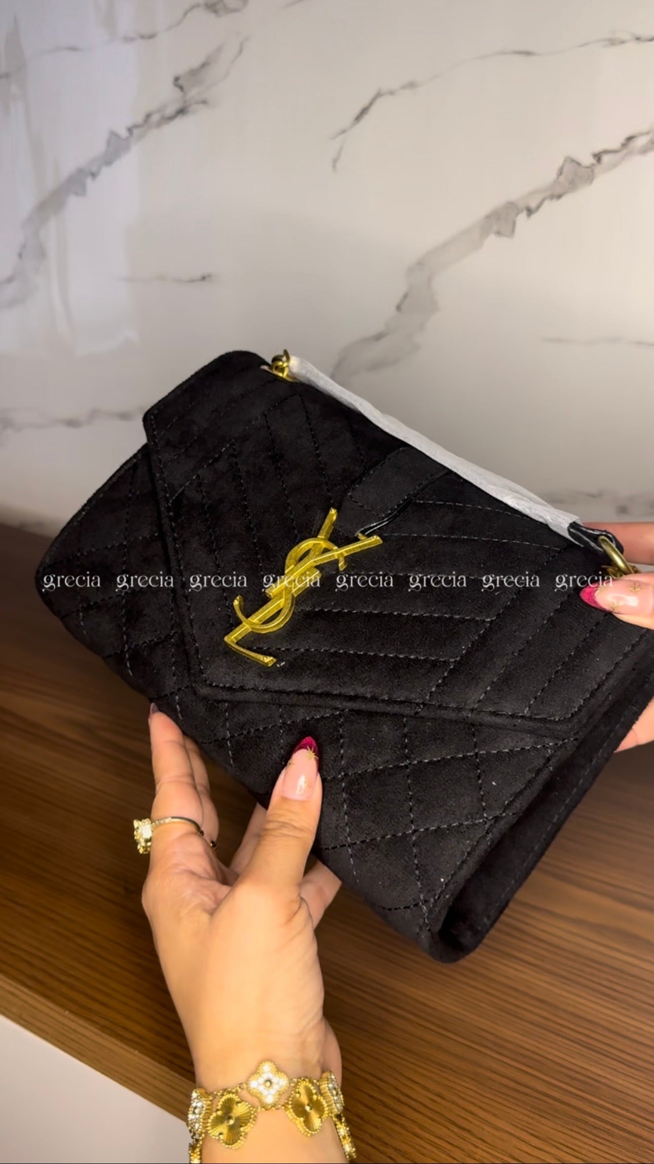 YSL negra con dorado