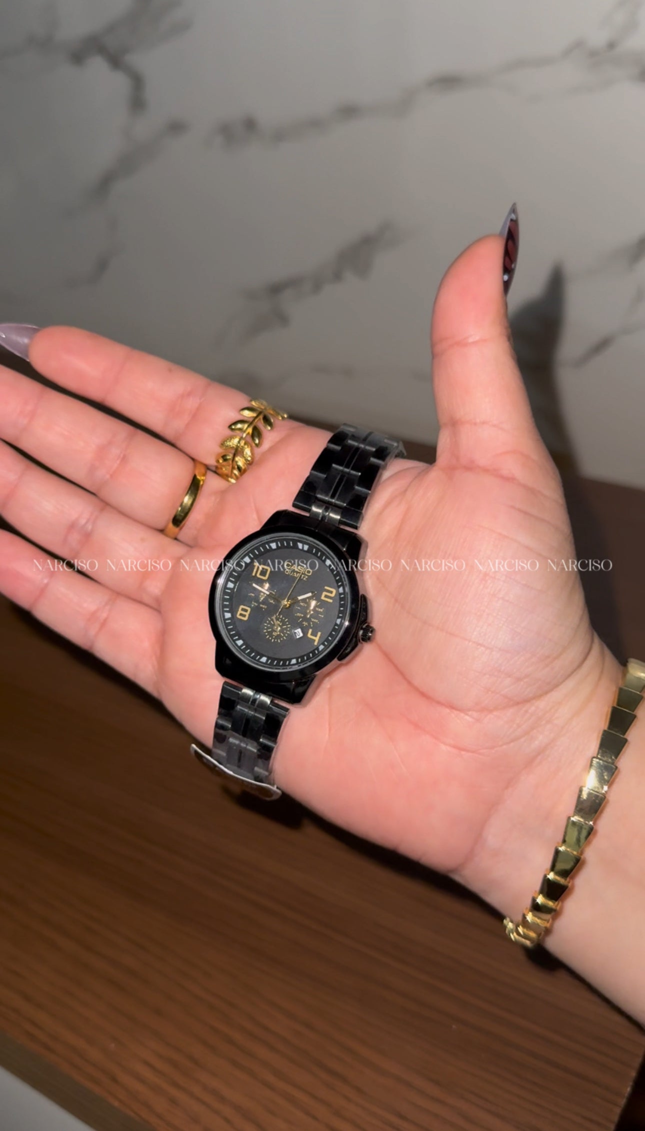 Dúo Casio negro con dorado