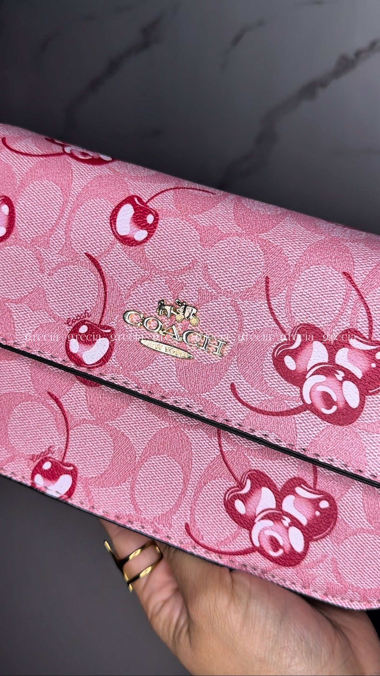 Coach Nolita Cherry rosa